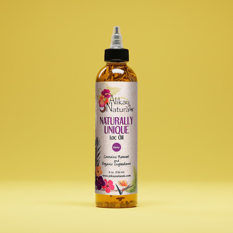 Applying Alikay Naturals Naturally Unique Loc Oil to the scalp and locs for daily moisture and growth