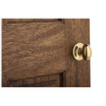 Kwikset Aliso Passage Knob With 6-Way Adjustable Latch And Round Corner Strike, Bright Polished Brass