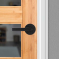 Kwikset Milan Passage Lever, Round Rose With 6-Way Adjustable Latch And Round Corner Strike, Matte Black