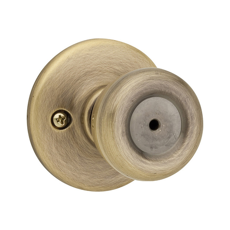 Kwikset Tylo Privacy Knob With 6-Way Adjustable Latch And Round Corner Strike, Antique Brass