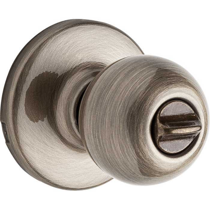 Kwikset Polo Privacy Knob With 6-Way Adjustable Latch And Round Corner Strike, Antique Brass