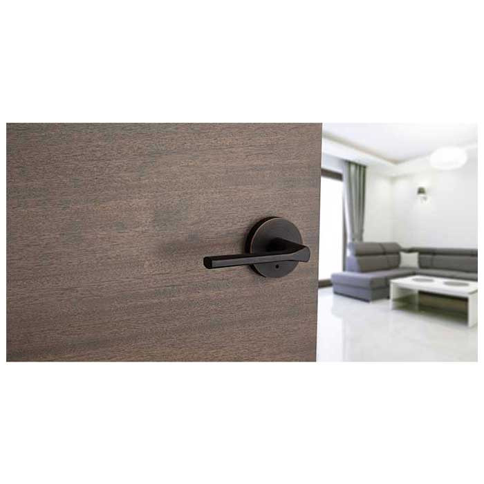 Kwikset Lisbon Privacy Lever With Round Rose, 6-Way Adjustable Latch And Round Corner Strike, Venetian Bronze