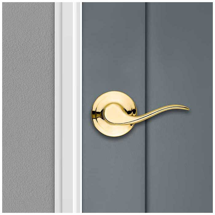 Kwikset Tustin Passage Lever With 6-Way Adjustable Latch And Round Corner Strike, Bright Polished Brass