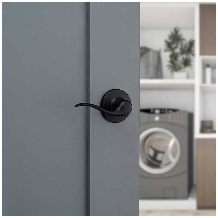 Kwikset Tustin Passage Lever With 6-Way Adjustable Latch And Round Corner Strike, Matte Black