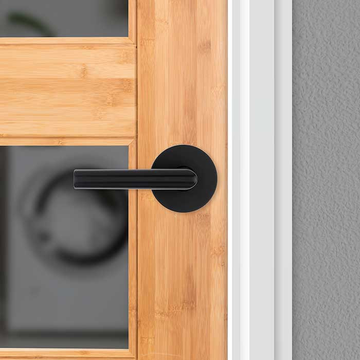 Kwikset Milan Passage Lever, Round Rose With 6-Way Adjustable Latch And Round Corner Strike, Matte Black