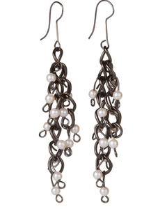 Photo of gunmetal pearl earrings handmade by jiana deon.