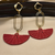 Lightweight fuchsia statement earrings with gold-tone accents