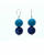 Picture of Sky VI earrings. Muted blue color with a galaxy bead accent for a look of luxury.