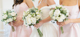 Wedding party with beautiful floral arrangements