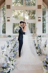Couple at wedding with Millie Collection