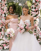 Wedding party with beautiful floral arrangements