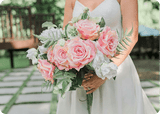 Cameron Bridal Bouquet made of pink roses, white peonies, green hellebores, and forest fern