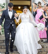 Bride and Groom walking out of church