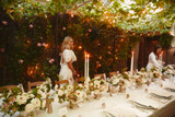 Wedding party with beautiful floral arrangements