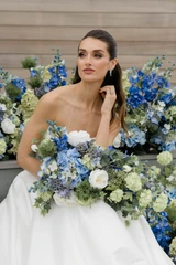 Bride holding Bethany Collection flowers