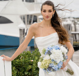 Bride holding Bethany Collection flowers