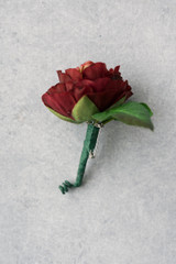 Stella Boutonniere (Burgundy Ranunculus)