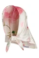 Ivory satin floral scarf featuring soft pink peony and ranunculus print, styled as a headscarf with a knotted front