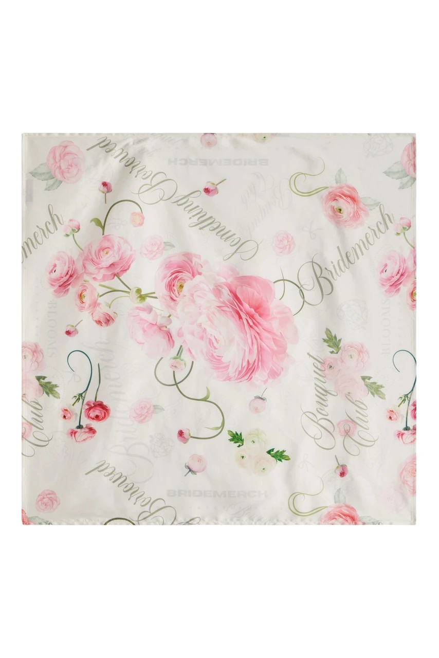 Ivory satin floral scarf with pink ranunculus print and Bouquet Club typography, displayed flat to showcase the full floral design.