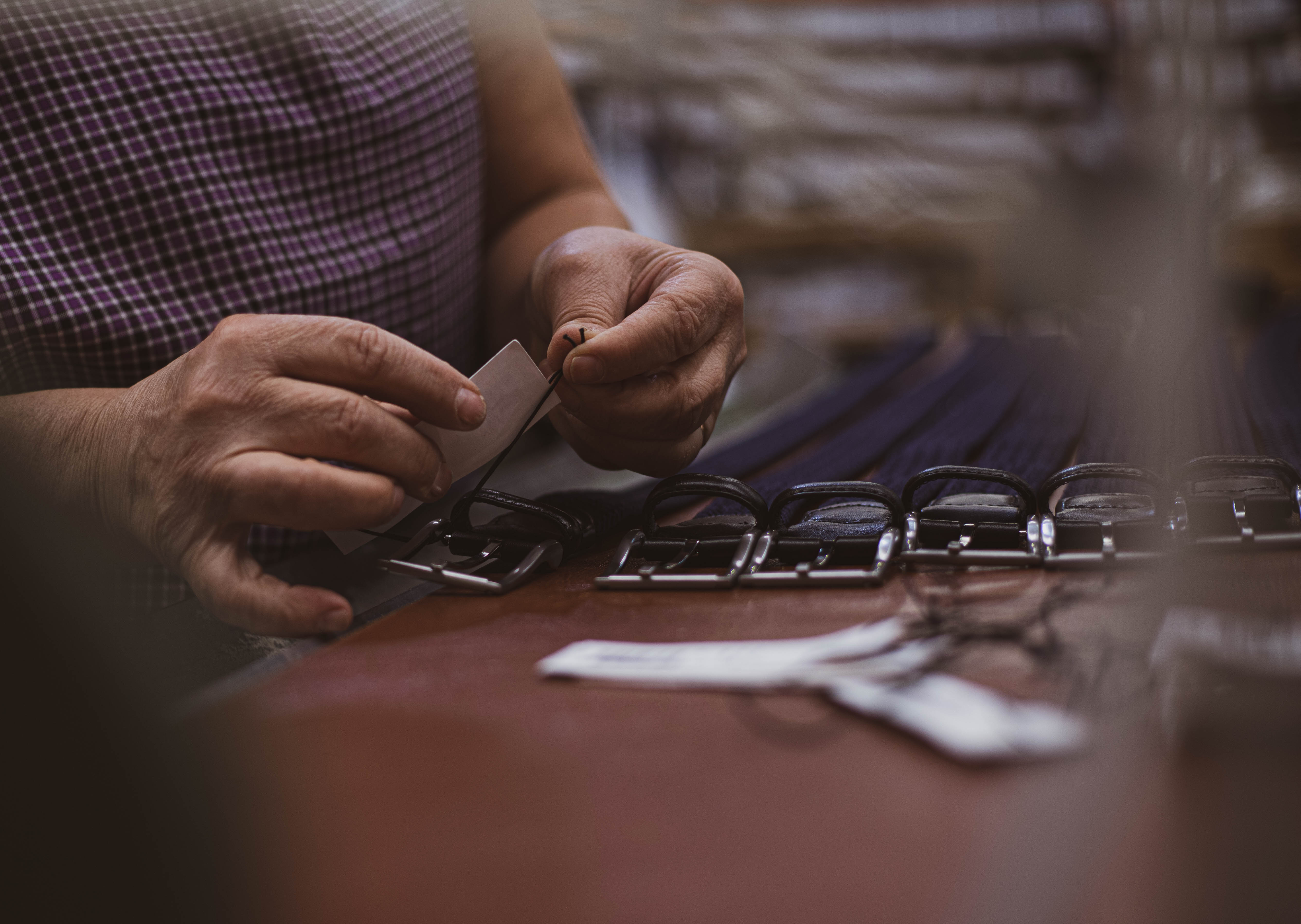 Premium Buckle leather belts displayed