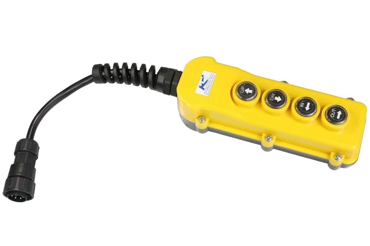 Yellow hydraulic pendant controller with four directional buttons