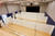 A gymnasium filled with EverPanels to setup private areas for parent teacher conferences.