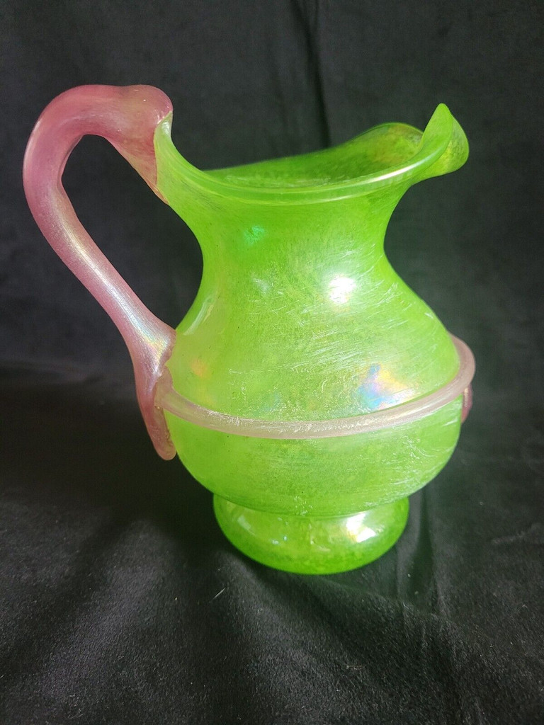 Green Glass Pitcher with Pink Handle and Lions Head Applique