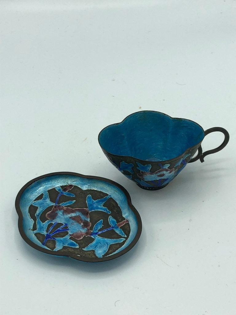 Antique copper enamel tea cup with saucer
