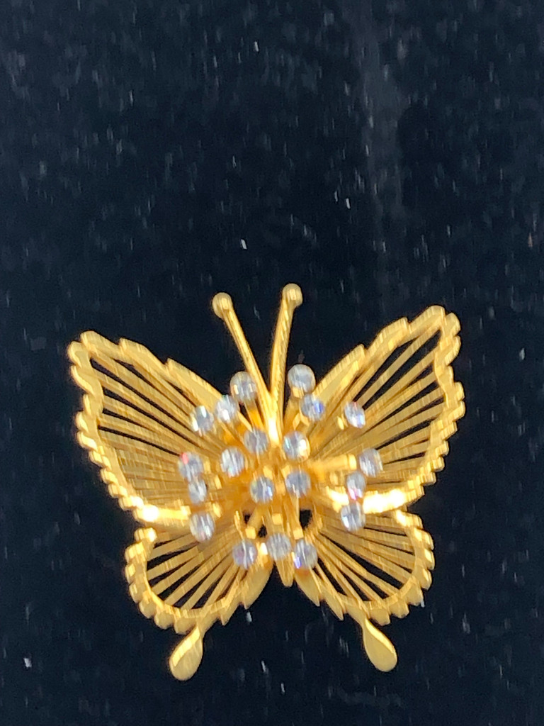 Gold tone jeweled butterfly brooch
