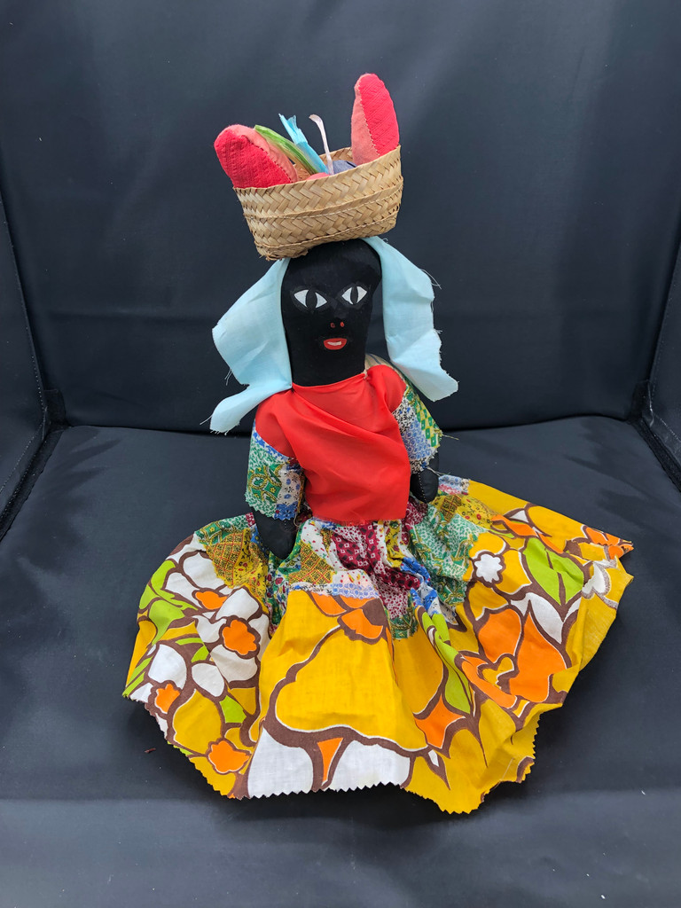 Handmade sitting doll