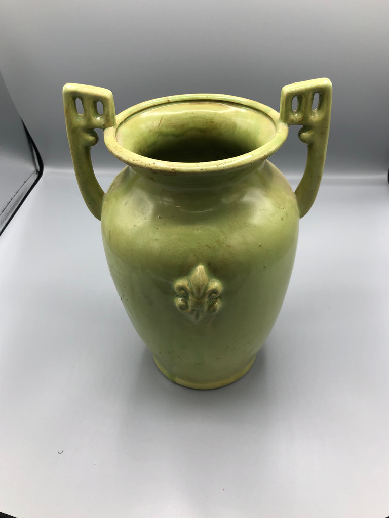 Green container with handle