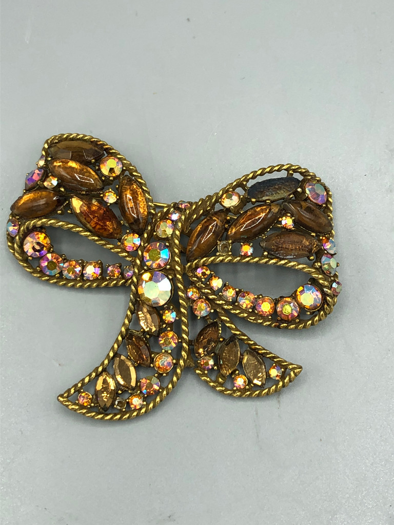 Multi colored stone bow brooch