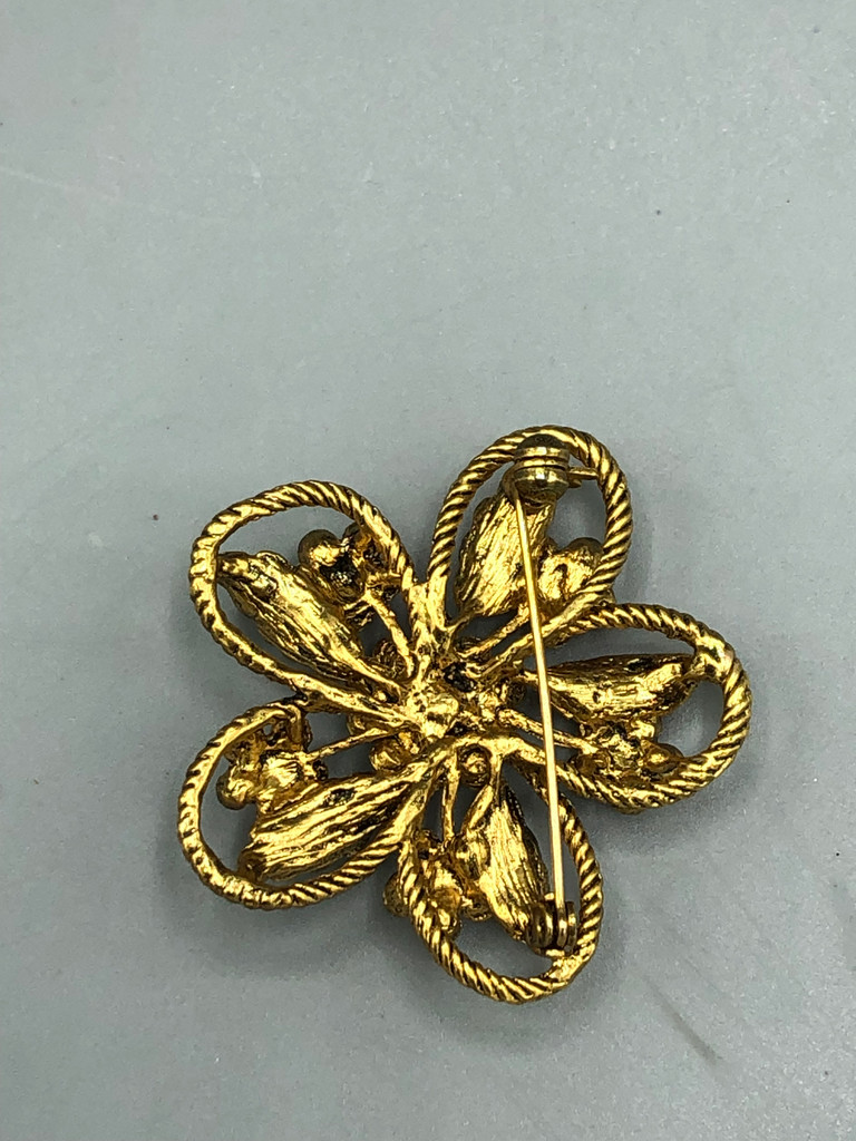 Gold tone  crystal flower brooch