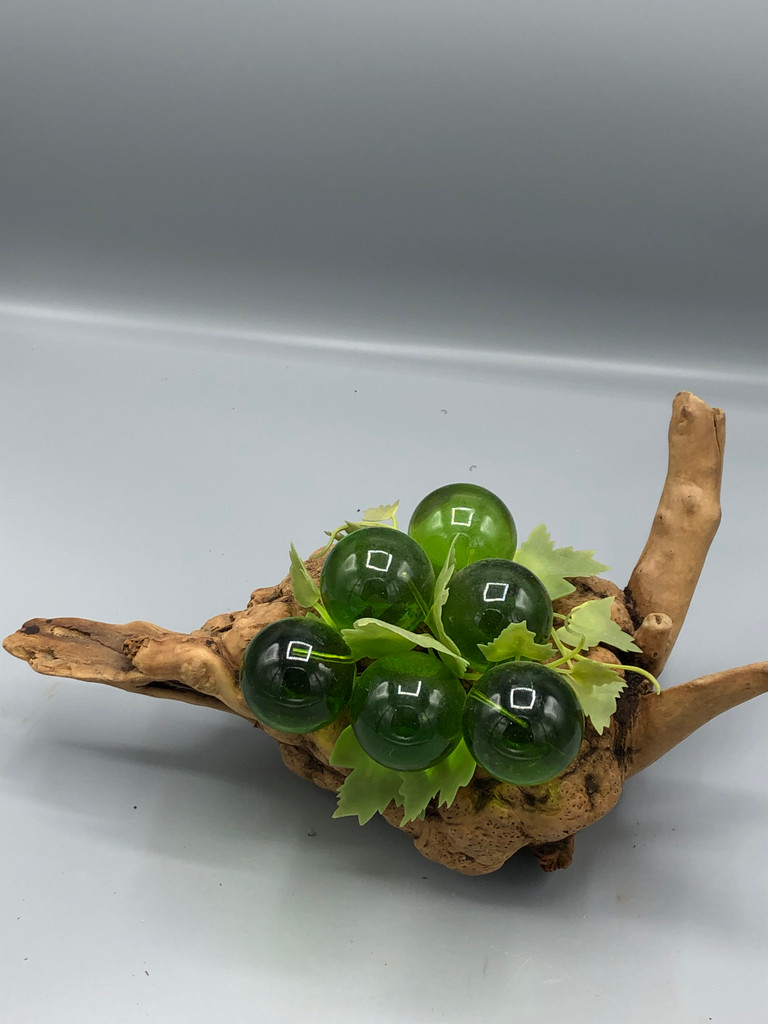 6 Cluster green grapes on wood