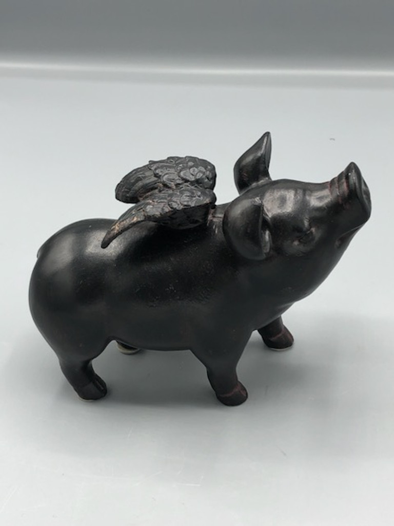 Wood pig with wing statue
