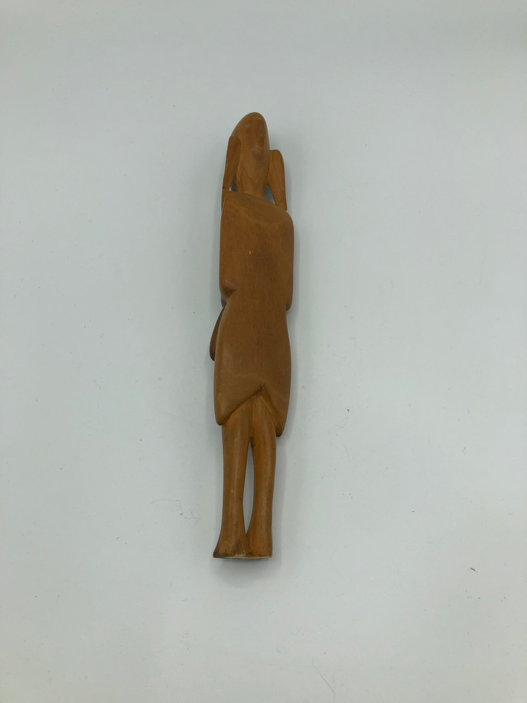 Carved wooden women figurine