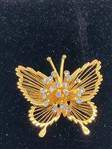 Gold tone jeweled butterfly brooch