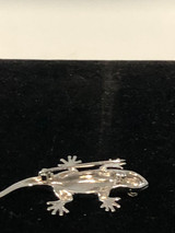 Silver tone lizard with inserted stone brooch