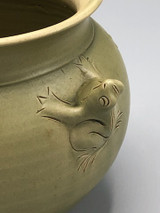 Pottery vase with frog handles