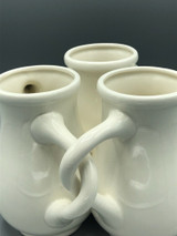 White fuddling cup vase