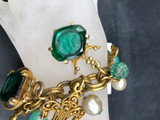 Link Bracelet with cut green glass