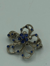 Vintage flower with blue rhinestone pin