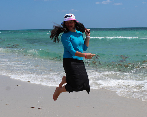 Jumping in air with zippered skirted capri style 2636 and style 2637 zippered swim top 