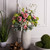 Vickerman Vickerman 13 inch White Frosted Glass Vase This lightly frosted vase is accented with a white diamond pattern Pair this vase with your favorite faux floral for the perfect finishing touch Each vase is slightly unique because each piece is hand bl