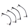 Four black 15cm right-angle guitar pedal patch cables on white background
