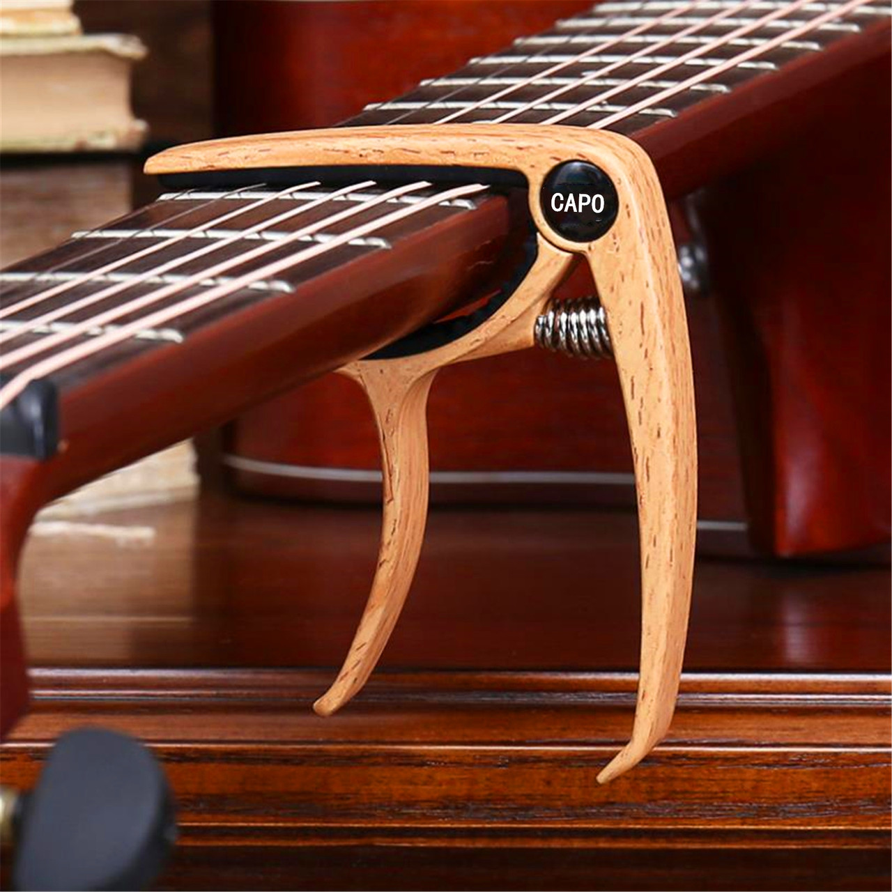 Guitar and Ukulele Trigger Capo – Light Wood Finish