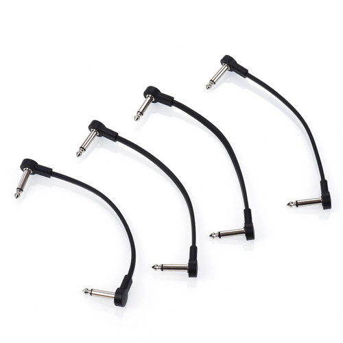 Four black 15cm right-angle guitar pedal patch cables on white background
