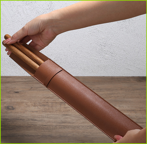 Brown PU leather drumstick holder shown in use