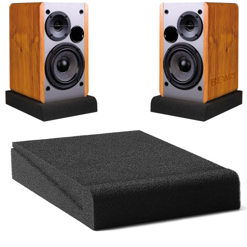 Pair of black studio monitor isolation pads with speakers