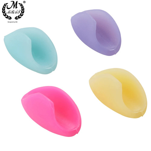 Two colourful silicone flute hand rest protectors